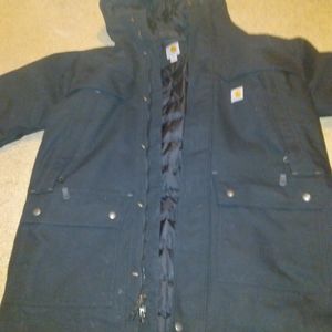 Carhartt storm defender parka with detachable fur.